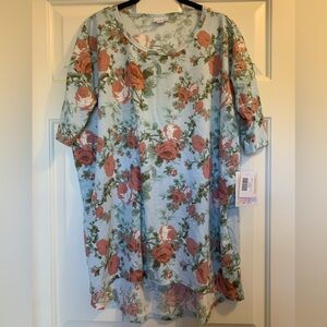 Medium LuLaRoe Irma Tunic Top in Light Blue background with Floral Pattern